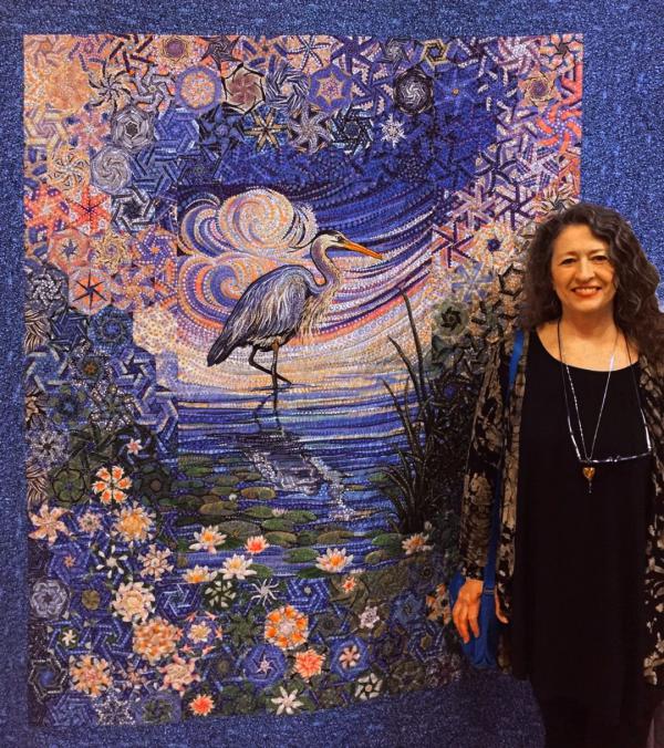 Kathy Kennedy with quilt
